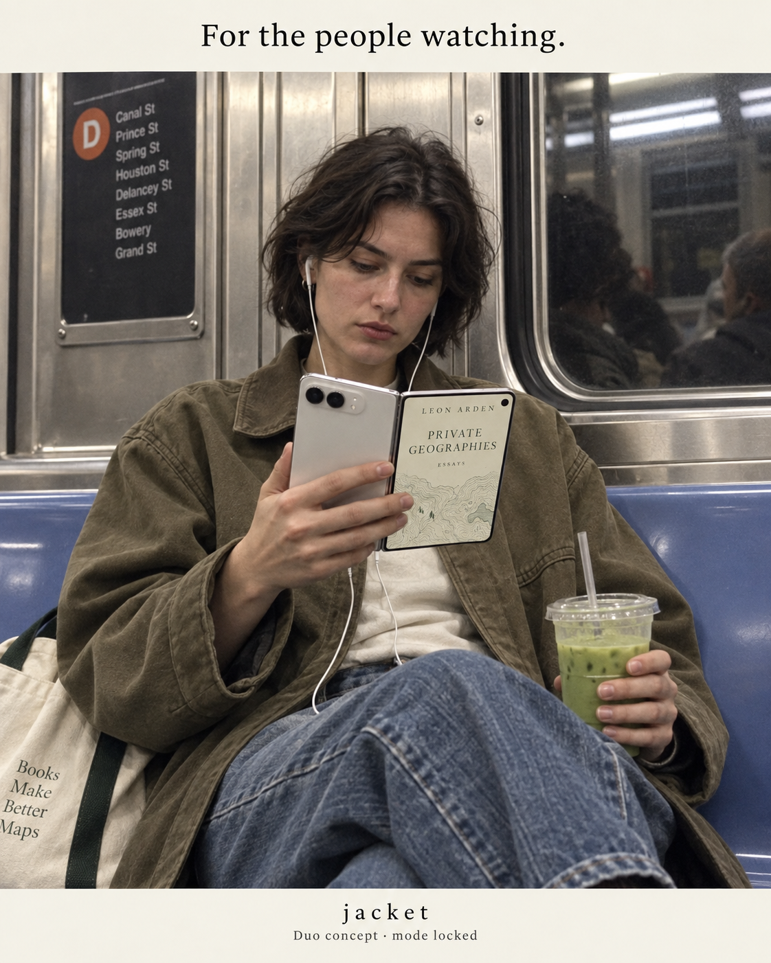 A commuter in an olive jacket displays Private Geographies on a folding phone beside an iced matcha.